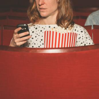 Moviegoers distracted by their cell phones