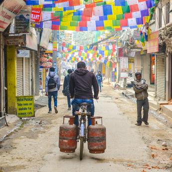 Person bicycling in Nepal 