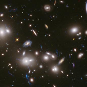 Telescope image of dozens of galaxies clustered in space