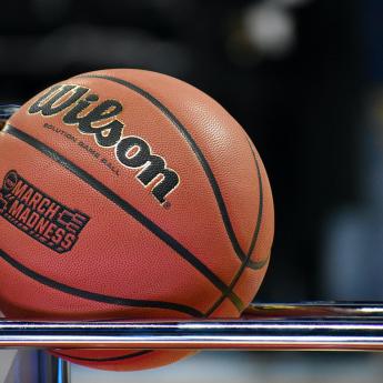 A Wilson basketball rests on a rack during the NCAA men's basketball tournament