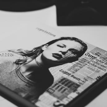A black and white image of a book cover featuring Taylor Swift