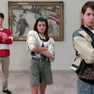 Three actors from the film Ferris Bueller's Day off stand diagonally from each other with their arms crossed. Behind them are several paintings.