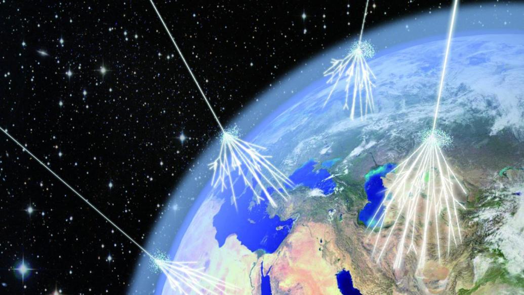 Illustration of cosmic rays making contact with Earth