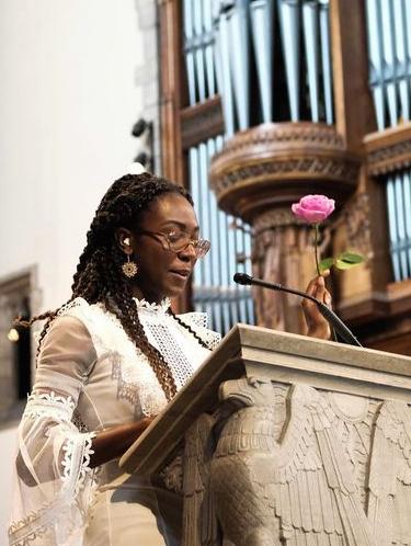 Dinah Clottey speaks at the Rockefeller Chapel podium during the inaugural Black Convocation in 2019