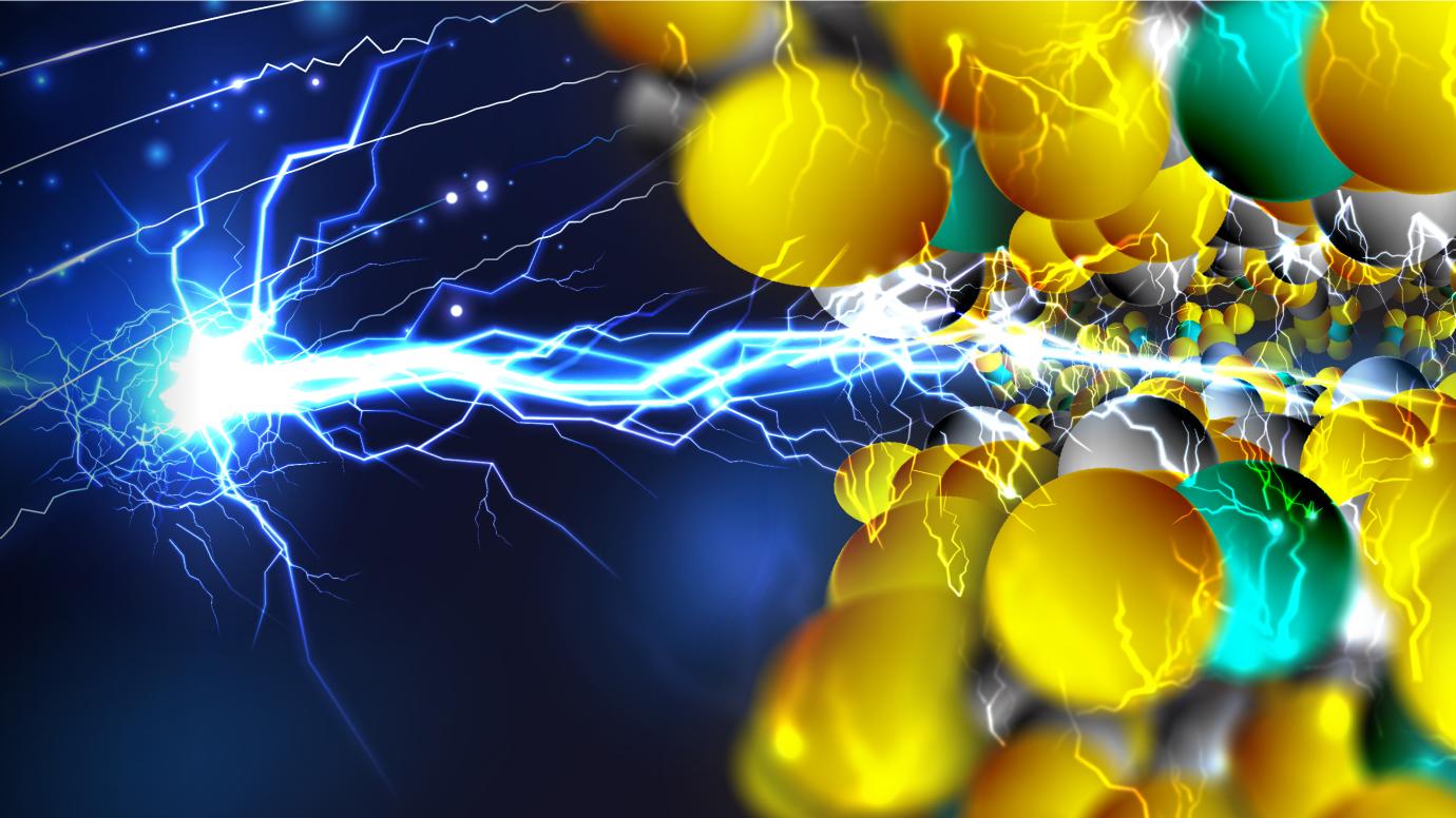 Cartoon showing electricity bolt entering a lattice of atoms