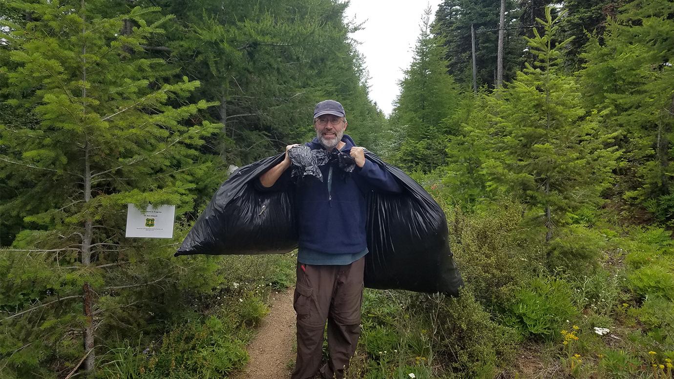 Greg Dwyer collecting samples in Washington State.