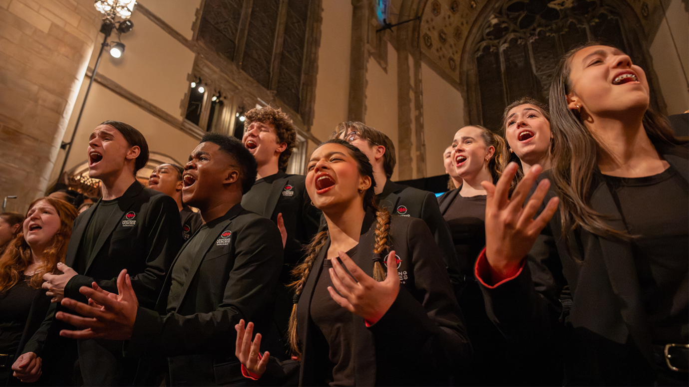 Choir members sing together