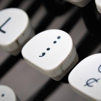 Semicolon on a typewriter