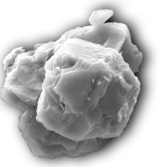 black and white image, close-up of crystalline dust fragment