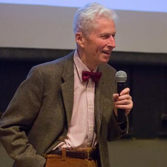 Roger Hildebrand in bow tie with microphone