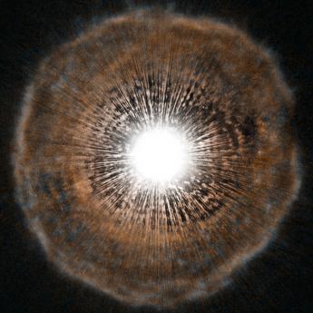 Illustration of a bright light at the center of a reddish star