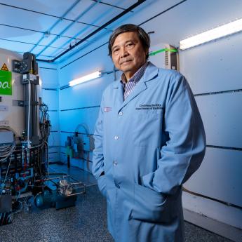 Chin-Tu Chen stands by the IBA Cyclone 18 cyclotron at the UChicago Medicine Cyclotron Facility in the basement of Mitchell Hospital.