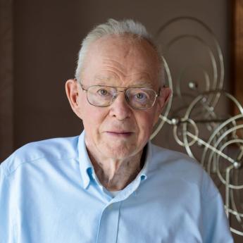 Eugene Parker poses for a portrait in his Hyde Park home in 2019