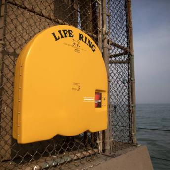 A life ring hangs next to Lake Michigan