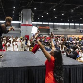 A guest artist performs at the Black Women’s Expo at the McCormick Place