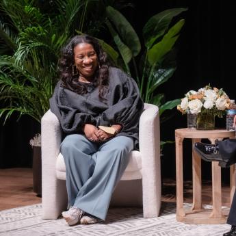 Tarana Burke (left) talks with Cathy Cohen, the David and Mary Winton Green Distinguished Professor of Political Science at the University of Chicago, during an event at the Reva and David Logan Center for the Arts. 