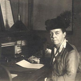 Dean of Women Marion Talbot at her desk. 