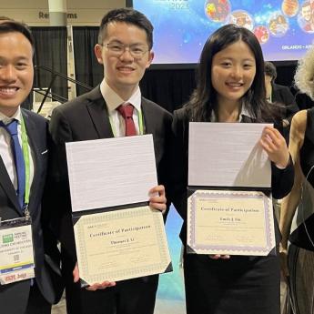 Long Nguyen, Thomas Li, Emily Shi and Marsha Rosner at the 2023 American Association for Cancer Research's annual meeting in Orlando, Florida