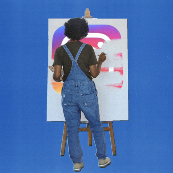 A Black woman in overalls stands before a canvas on an easel, painting