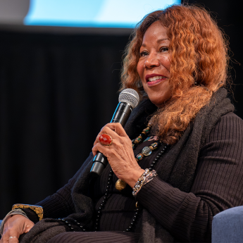 Ruby Bridges speaks into a microphone