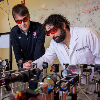 UChicago quantum researchers Peter Maurer and Uri Zvi in their lab