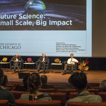 Audience looking at "Future Science" panelists on stage