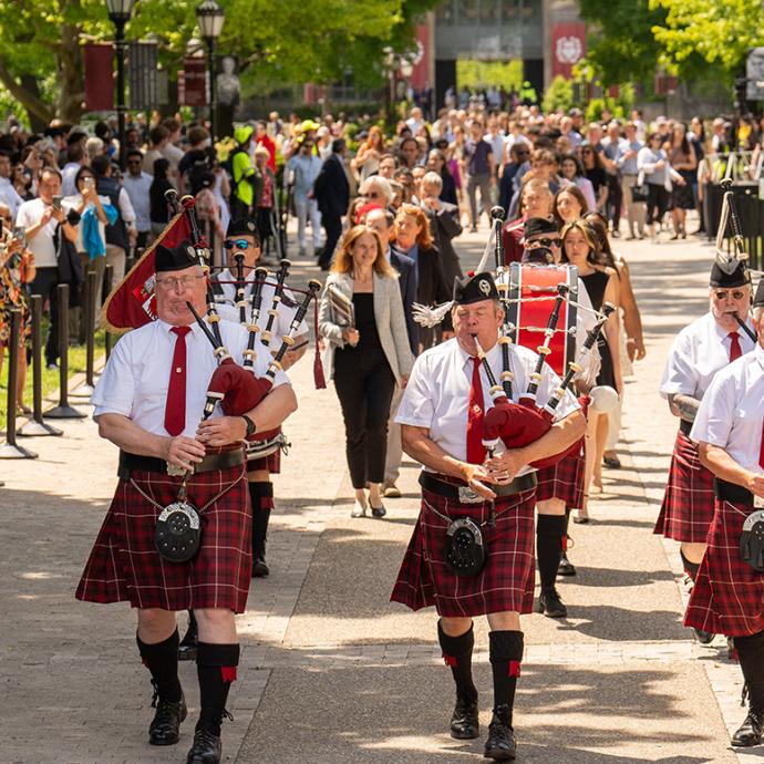 Bagpiper band procession at the Class Day ceremony