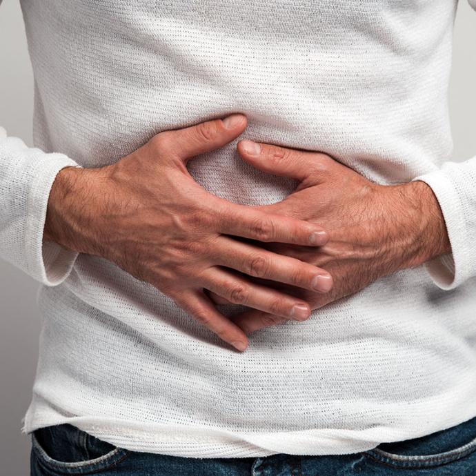 A person experiencing stomach pain