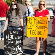 Group of people protesting facemasks at a rally in Helena, Montana