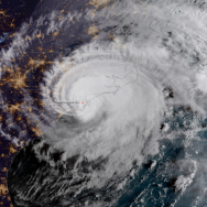 Satellite photo of hurricane halfway over land