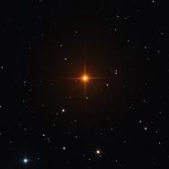 Telescope image focused on a red star