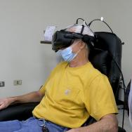 Scott Imbrie wears a VR headset