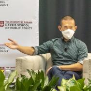 Atlantic journalist Ed Yong gestures while on stage at University of Chicago event 
