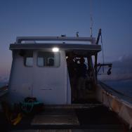 A lobster crew out at sea before dawn