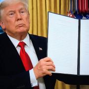 Donald Trump signs an Executive Order