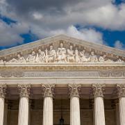 The white columns, peaked roof and bas-relief of the U.S. Supreme Court building