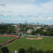 Baseball and football fields with Chicago skyline in background