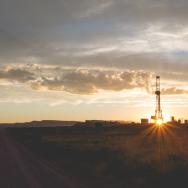 Landscape with fracking drill in background